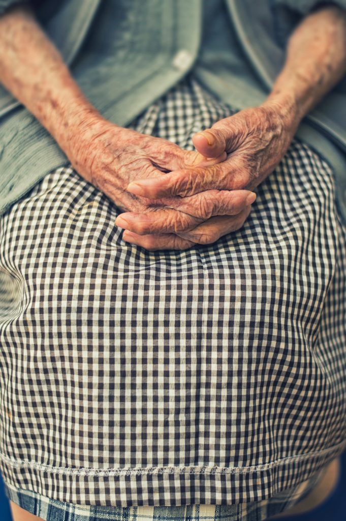 Photo of an old woman's hands. This post is about an old woman's antics.